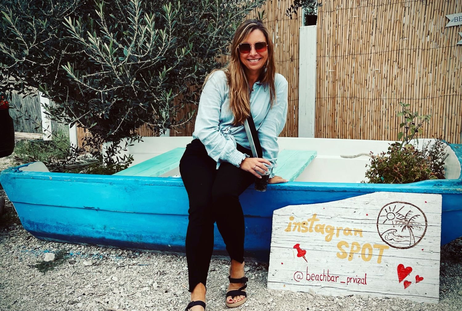 Kristin Freeman at a beach bar on a small Croatian island