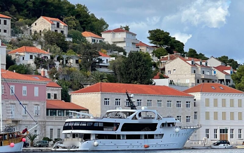 Private charter yacht tied up in a small island harbor in Croatia
